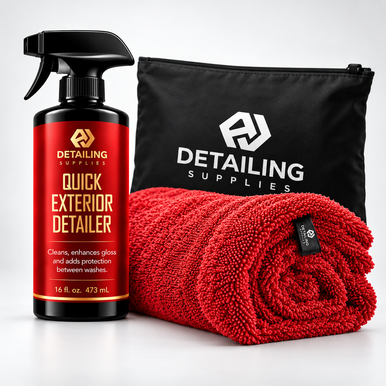 A&J Quick Exterior Detailer with red microfiber drying towel and branded black storage pouch